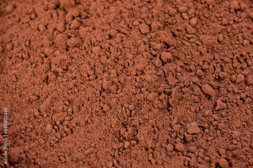 cocoa powder in a bowl shot on a macro lens, powder for making chocolate. cocoa powder in a bowl shot on a macro lens, powder for making chocolate.