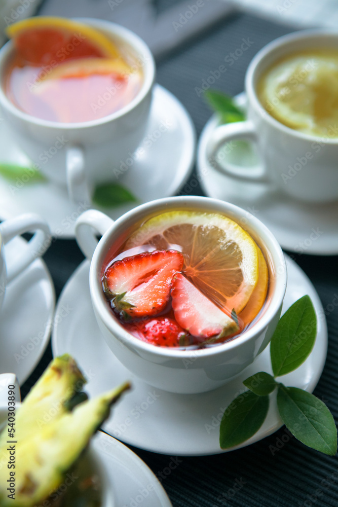 tea floating in strawberries and lemons tea floating in strawberries and lemons