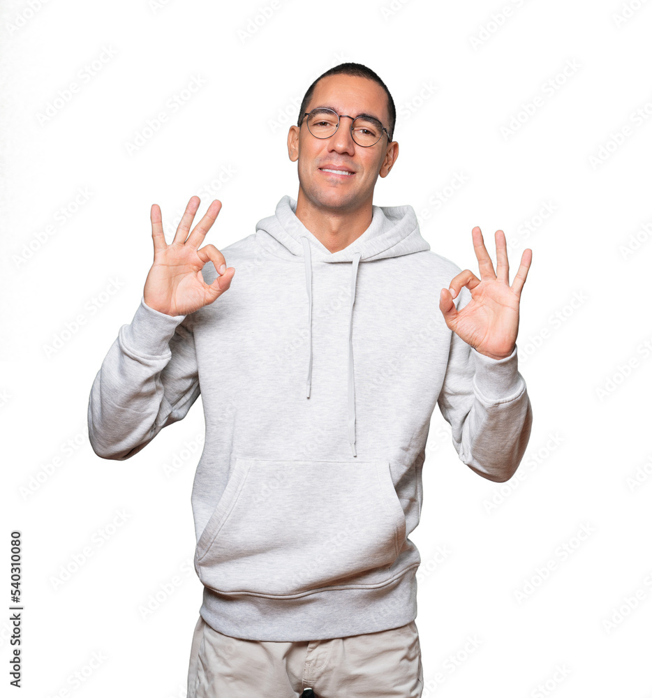 Fototapeta premium Surprised young man with a gesture of approval