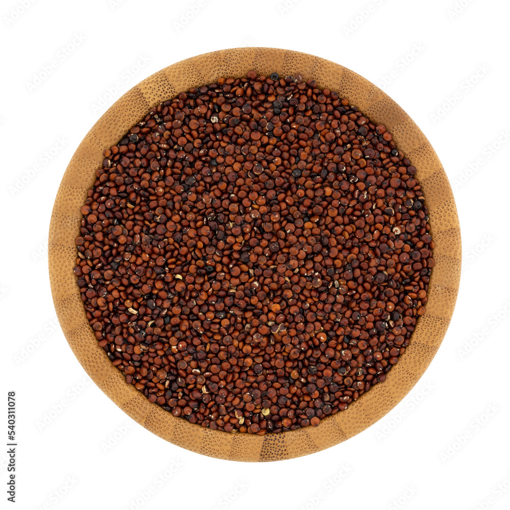 Top view of a wood bowl filled with red quinoa isolated on a white background. Top view of a wood bowl filled with red quinoa isolated on a white background.