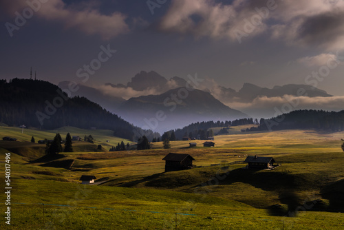 Sunrise on Seiser Alm mountain meadow in Dolomites