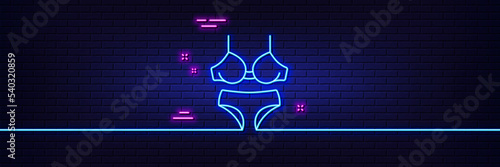 Neon light glow effect. Lingerie line icon. Breast bra and Panties sign. Women underwear symbol. 3d line neon glow icon. Brick wall banner. Lingerie outline. Vector