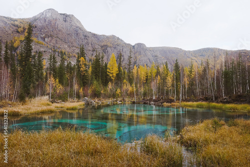 turquoise lake in Altai mountains in autumn © Наталия Бушкевич