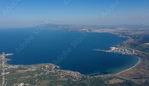 Aerial view of Erdek Kapidag peninsula and bay from top with blue sky and sea