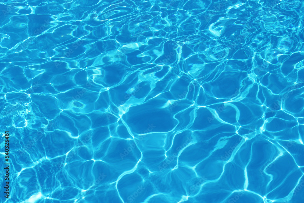 blue water ripples of the pool