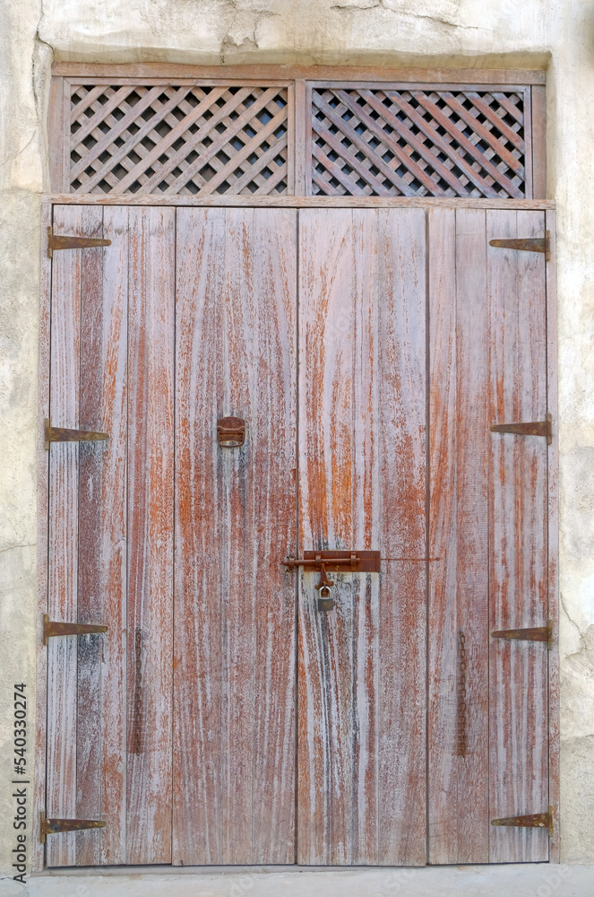 Old ancient medieval wooden door. Old wood / timber texture. Rusty iron finish. Old ancient medieval wooden door. Old wood / timber texture. Rusty iron finish.