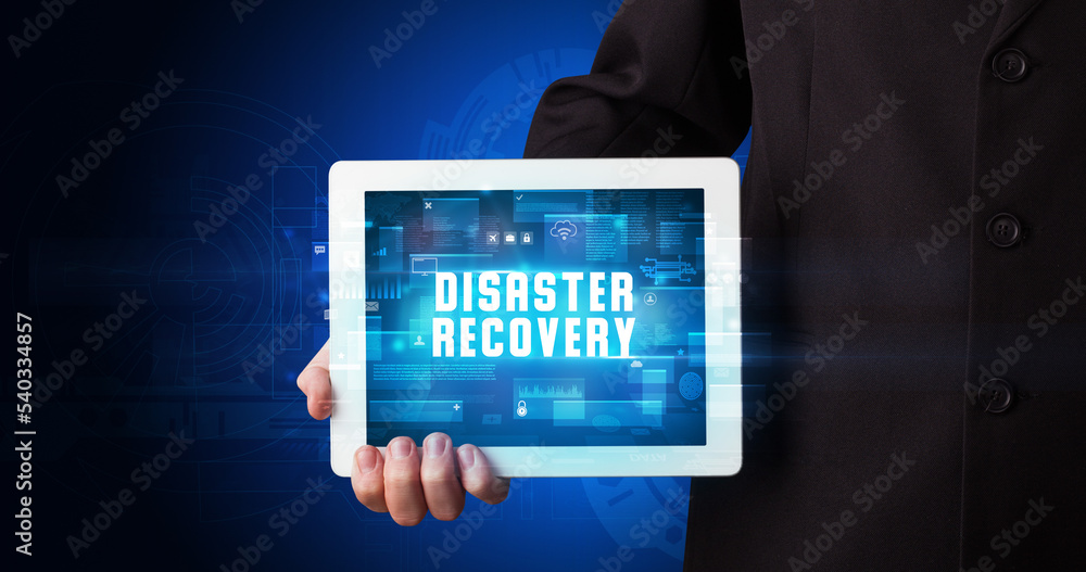 Person holding tablet, security concept Person holding tablet, security concept