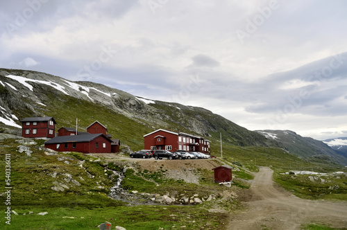 Jotunheimen, Norway - Red wooden houses in the mountains for tourist accommodation. photo