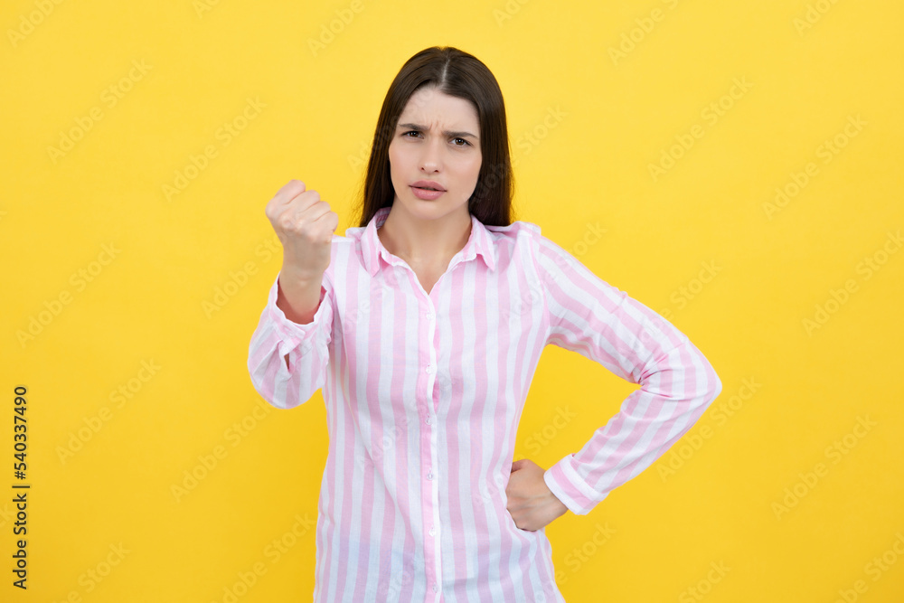 Negative woman show no decline forbidden rule isolated over yellow background. Displeased angry woman blocking offer, showing cross stop gesture, negative reply. Negative woman show no decline forbidden rule isolated over yellow background. Displeased angry woman blocking offer, showing cross stop gesture, negative reply.