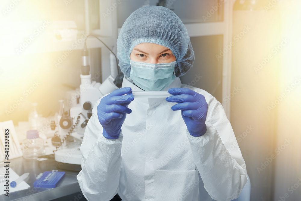 Scientist or nurse in a Medical Research Laboratory. Test tube Scientist or nurse in a Medical Research Laboratory. Test tube