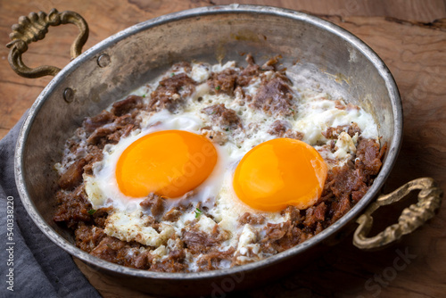 From traditional Turkish cuisine; fried eggs with meat. Turkish name; kavurmali yumurta
