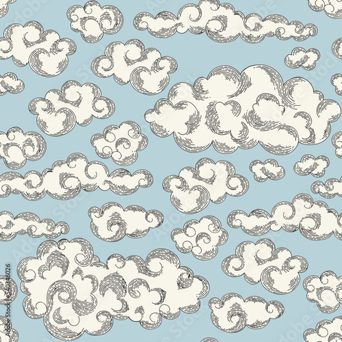 Vector seamless pattern with clouds. Sky pattern on a blue background. Hand drawing.