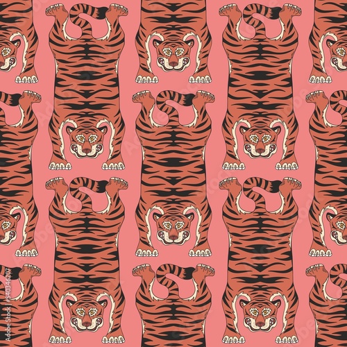 Tiger skin. Vector seamless pattern with tigers on a roho background. Pattern for printing on fabric, wallpaper photo