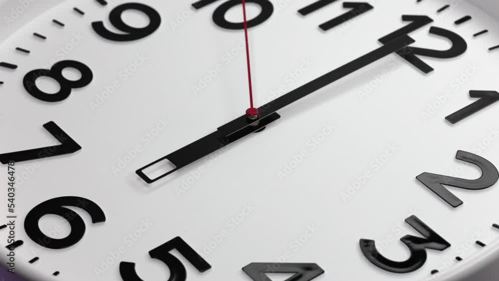 A White Wall Clock With The Time Of 6.00 Am Or Pm. A Black Hands and Red Second Hand Of The Clock, The Concept Of Time. 60 FPS, 4k A White Wall Clock With The Time Of 6.00 Am Or Pm. A Black Hands and Red Second Hand Of The Clock, The Concept Of Time. 60 FPS, 4k