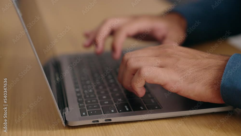 Young hispanic man using laptop at office Young hispanic man using laptop at office