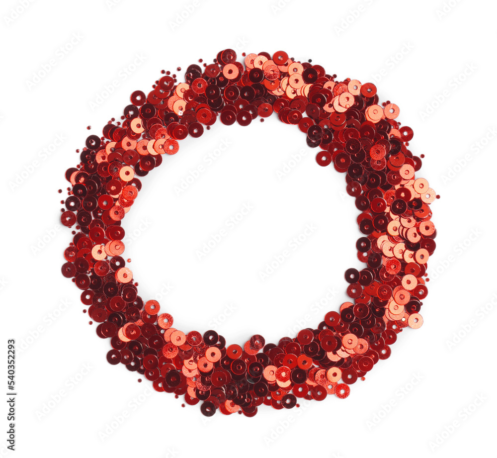 Pile of red sequins isolated on white, top view Pile of red sequins isolated on white, top view