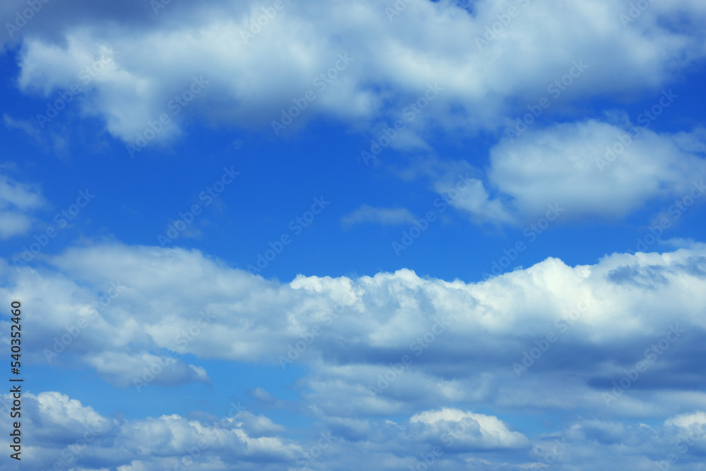Picturesque view of blue sky with fluffy white clouds Picturesque view of blue sky with fluffy white clouds