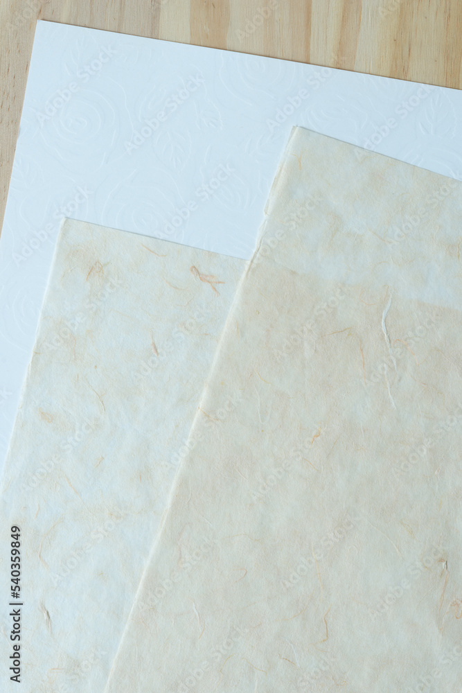 tissue paper on blank paper and wood tissue paper on blank paper and wood