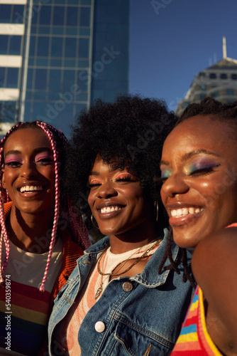 Portrait of young friend group together smiling in the city 
