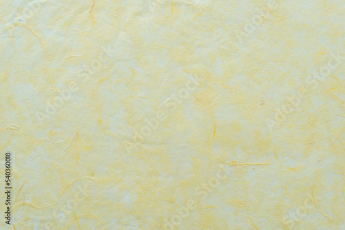 textured yellow tissue paper background © eugen