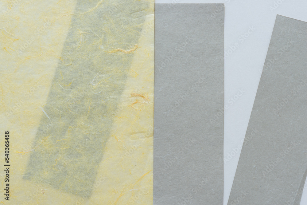 Fototapeta premium background with tissue paper and gray paper stripes