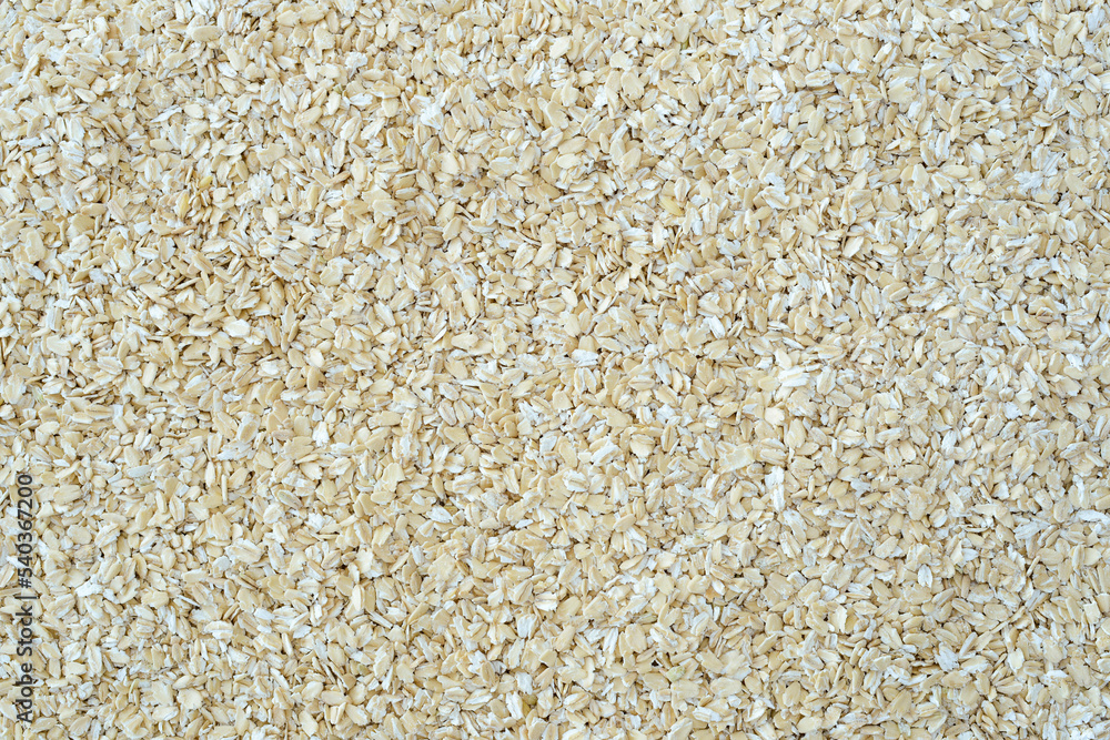 Oat cereal grains. Oat cereal flake. Closeup of grains, background, texture Oat cereal grains. Oat cereal flake. Closeup of grains, background, texture