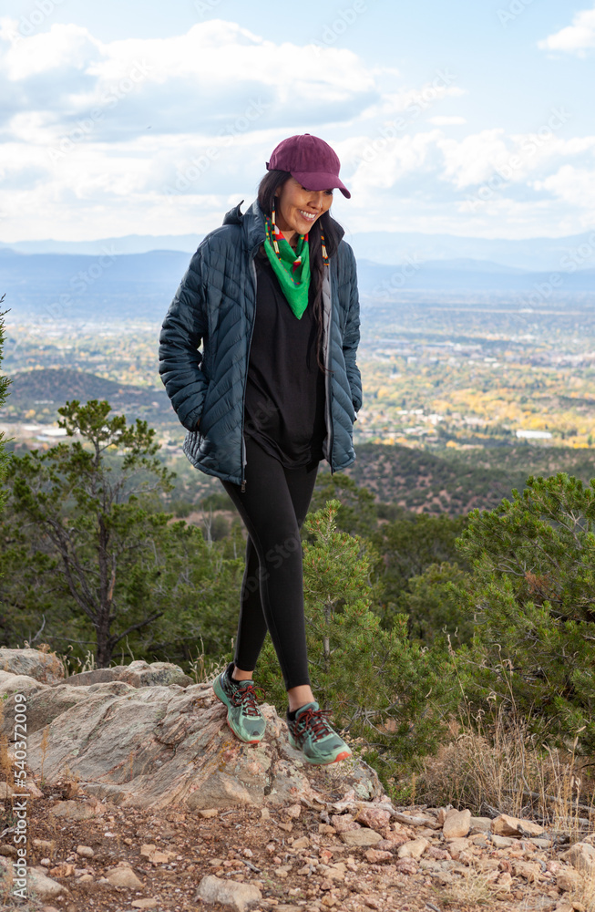 Naklejka premium Woman hiking in Santa Fe, New Mexico