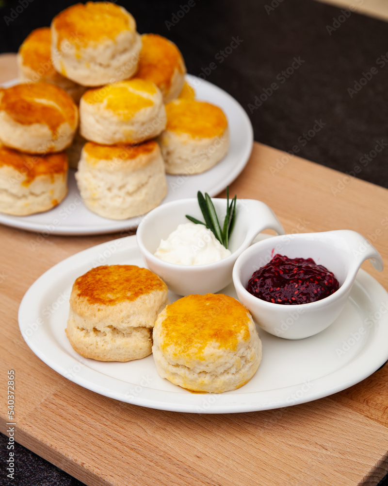 Homemade British Scones with clotted cream and raspberry jam 