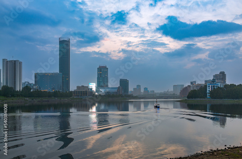 Sunset on a pond in the center of the city. Yekaterinburg, Russia photo