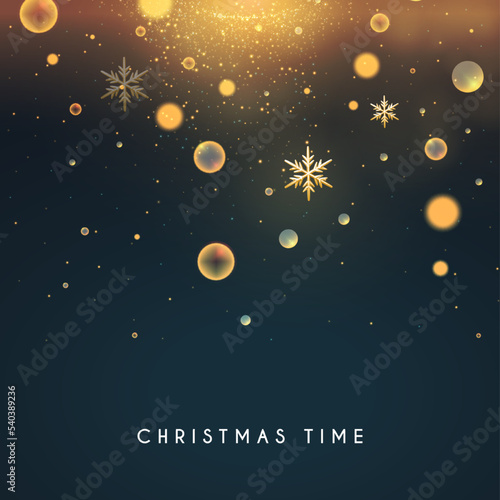 Christmas bokeh light effect with gold sowflakes. © feaspb