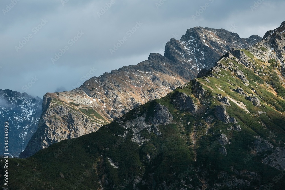 Peaks of the Slovak High Tatras in the evening light, view from blue trail to Sea Eye pond (Morskie Oko), Carpathians, Poland