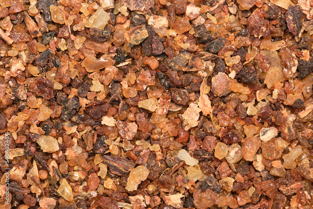 Myrrh, the aromatic gum resin of several species of the genus Commiphora. It is one of the best-known fragrances and was in ancient times one of the most important incense. Close up, top view Myrrh, the aromatic gum resin of several species of the genus Commiphora. It is one of the best-known fragrances and was in ancient times one of the most important incense. Close up, top view
