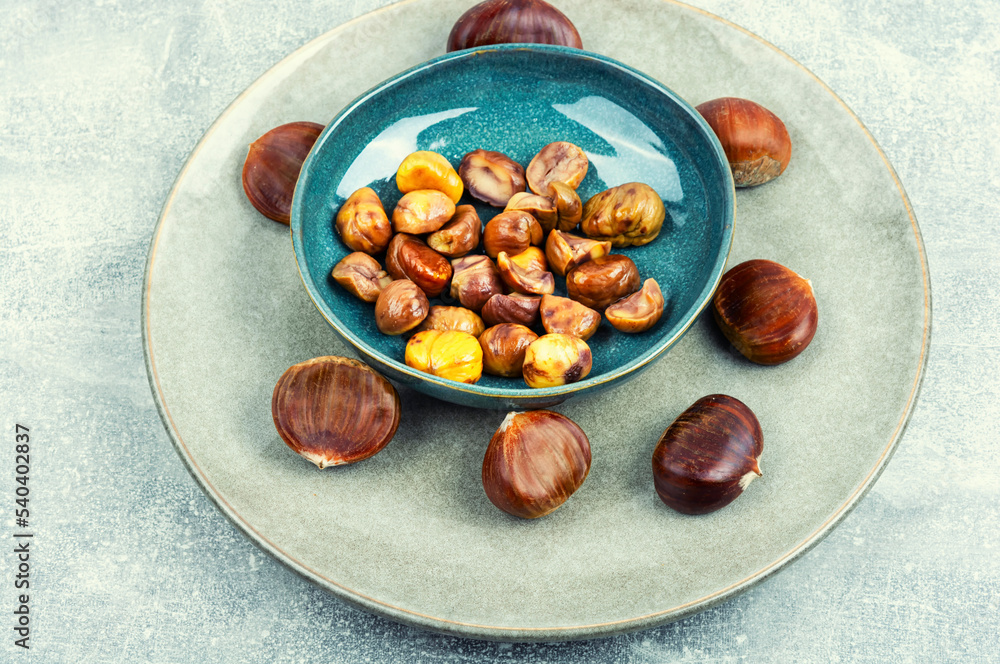 Peeled fried chestnuts, appetizing dessert. Peeled fried chestnuts, appetizing dessert.
