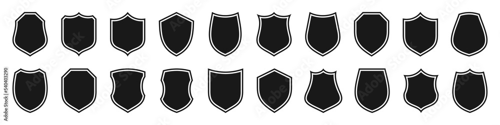 Set of various vintage shield icons. Black outlined heraldic shields. Protection and security symbol, label. Vector illustration.