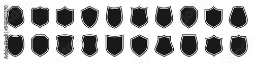 Set of various vintage shield icons. Black outlined heraldic shields. Protection and security symbol, label. Vector illustration.