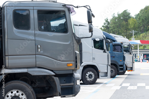 Truck fleet is parking in gasoline station