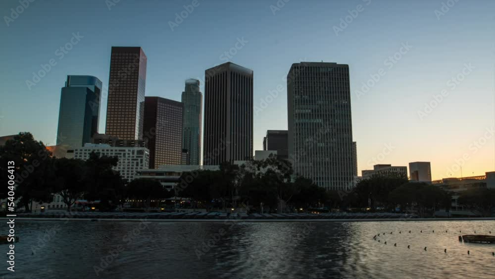 Lockdown Time Lapse Shot Of Corporate Buildings In City By Water - Los Angeles, California Lockdown Time Lapse Shot Of Corporate Buildings In City By Water - Los Angeles, California