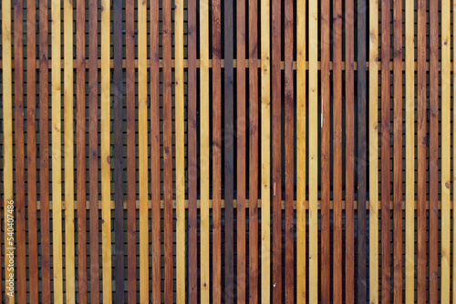 background cute multicolored wooden vertical fence rails.