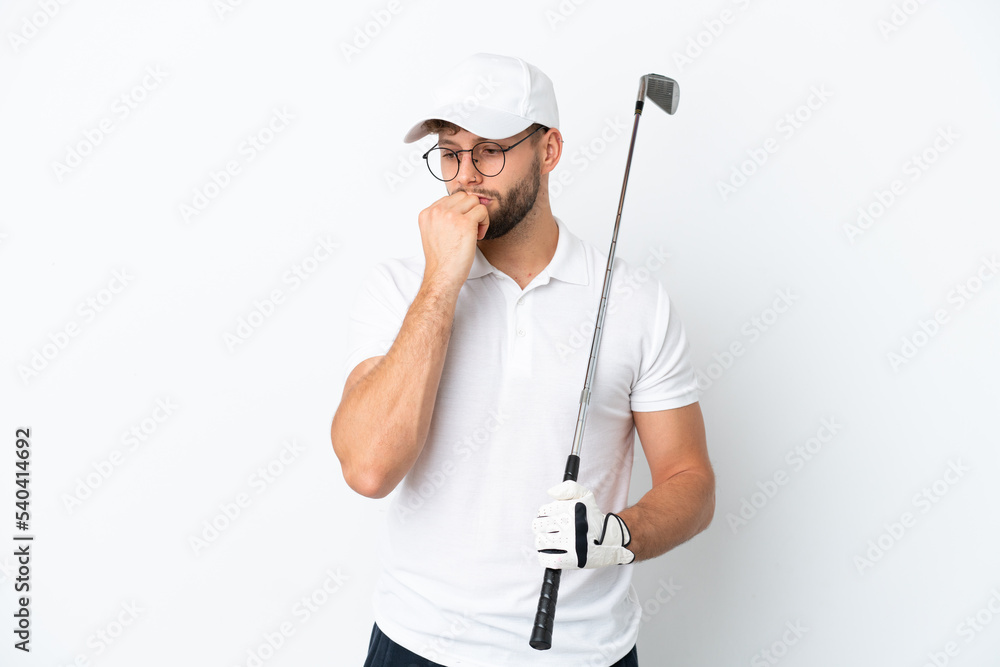 Handsome young man playing golf isolated on white background having doubts Handsome young man playing golf isolated on white background having doubts