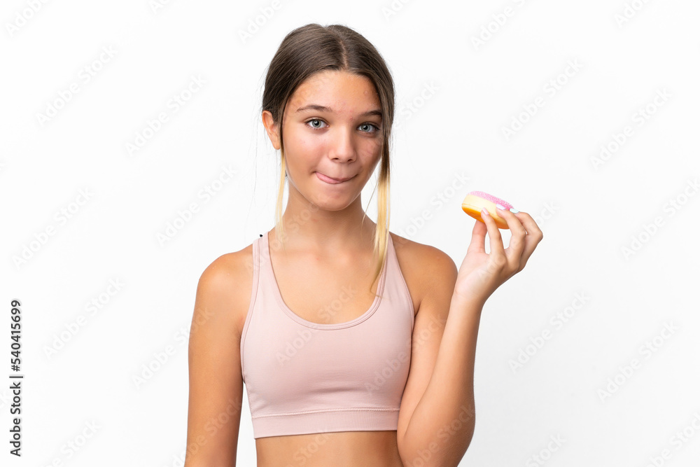 Little caucasian girl isolated on white background holding a donut Little caucasian girl isolated on white background holding a donut