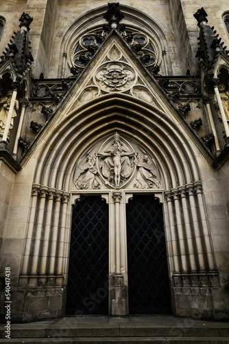 Vertical shot of the entry of the Saint Wenceslas Cathedral in Olomouc, Czech Republic photo