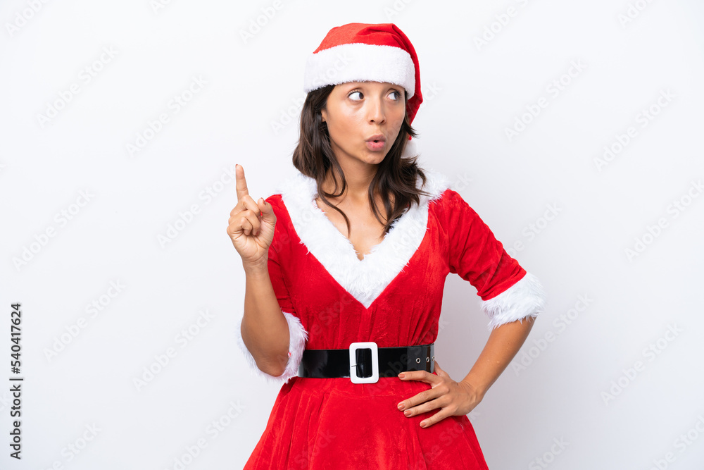 Young hispanic woman dressed as mama noel isolated on white background thinking an idea pointing the finger up Young hispanic woman dressed as mama noel isolated on white background thinking an idea pointing the finger up