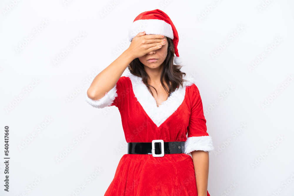 Young hispanic woman dressed as mama noel isolated on white background covering eyes by hands. Do not want to see something Young hispanic woman dressed as mama noel isolated on white background covering eyes by hands. Do not want to see something