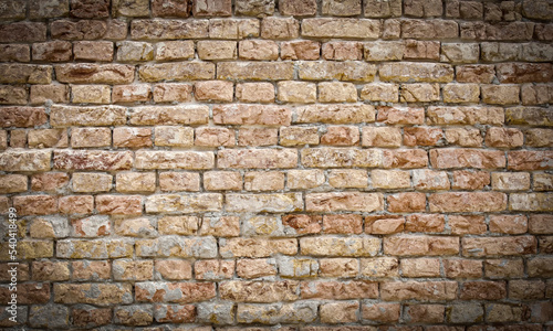 Old brick wall with white paint background texture close up