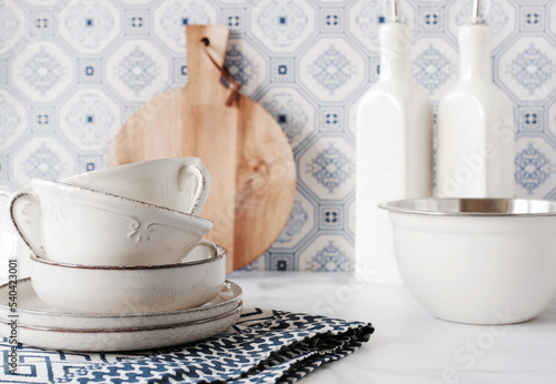 Kitchen utensils table Portuguese and Spain Azulejo tile background,trendy Eco style home still life. Space for text or menu . Business food brand template. 
