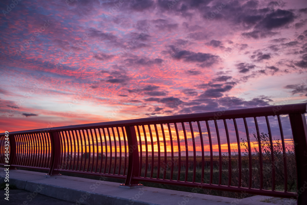 bridge rail with dramtiv morning sky