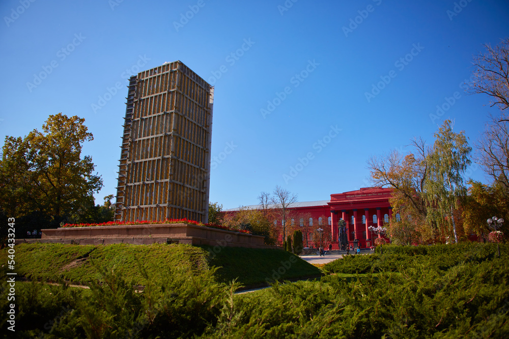 Kyiv, Ukraine - October 16, 2022: Monument to Taras Shevchenko protected from the bombing in Shevchenko Park in war time Kyiv, Ukraine - October 16, 2022: Monument to Taras Shevchenko protected from the bombing in Shevchenko Park in war time