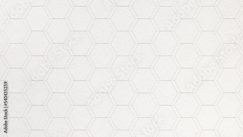 Hexagon or honeycomb pattern on a textured paper background. Close-up of a decorative and abstract paper with copy space. 4k resolution.