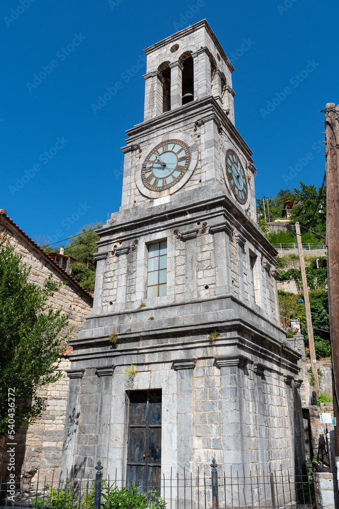 Church of Taxiarches (the greatest brigadiers) and bell clock tower in Lagadia village, Arcadia, Greece