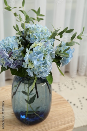Wallpaper Mural Beautiful blue hortensia flowers in vase on table indoors Torontodigital.ca